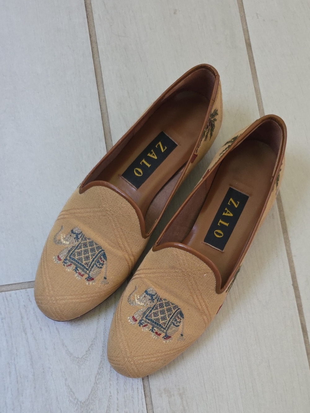 vintage Zalo brand needlepoint loafers featuring an embroidered elephant design.